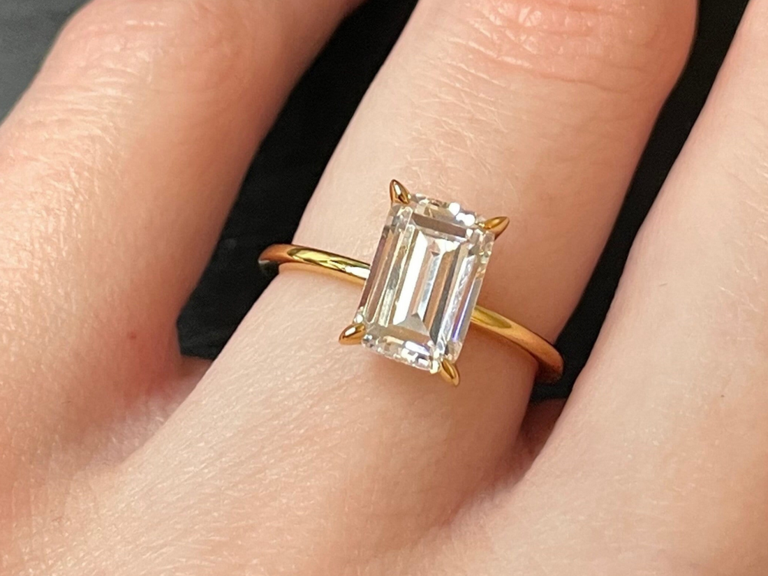 Fake emerald cut engagement rings discount